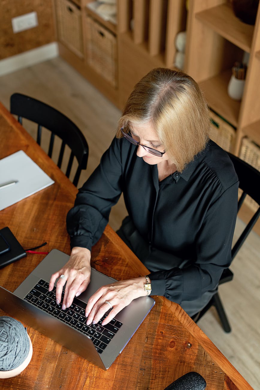 a businesswoman working on her laptop